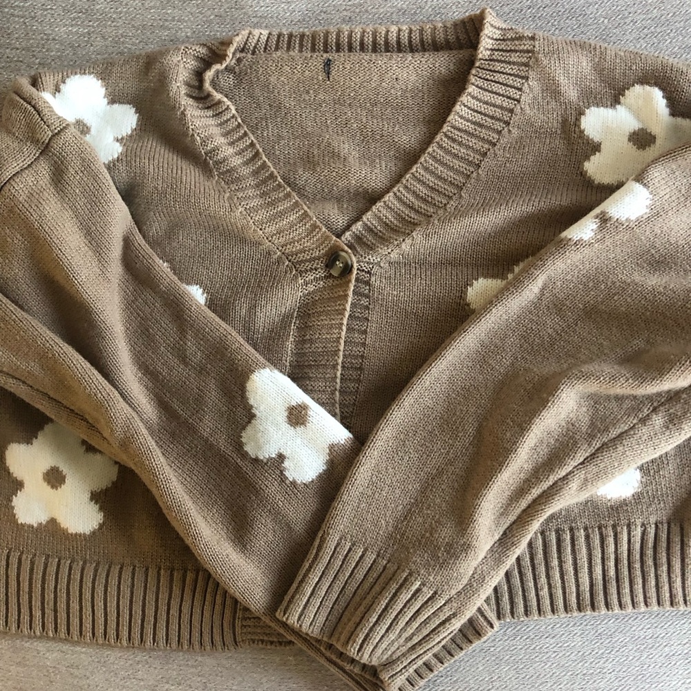 Flower sweater, very cute and kinda cropped.